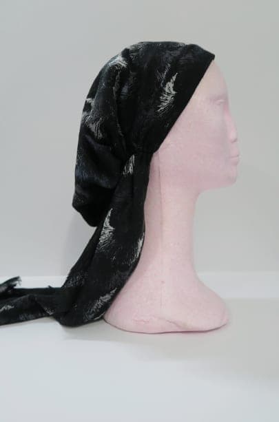 Ivory Feather on Black